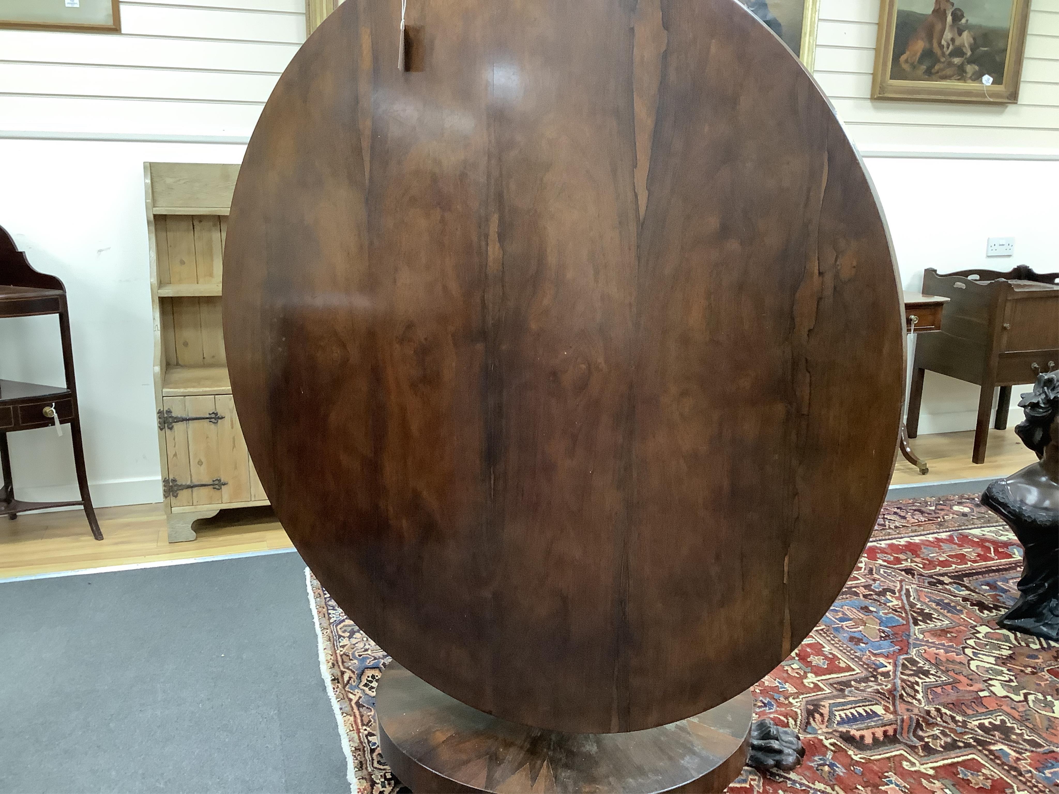 An early Victorian circular rosewood tilt top breakfast table, diameter 128cm, height 72cm